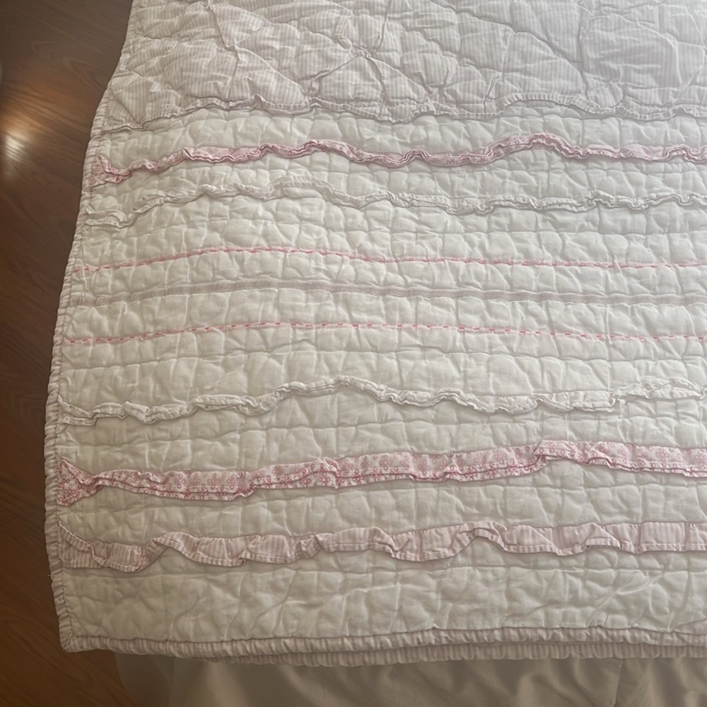 Pink and White Ruffled Quilt